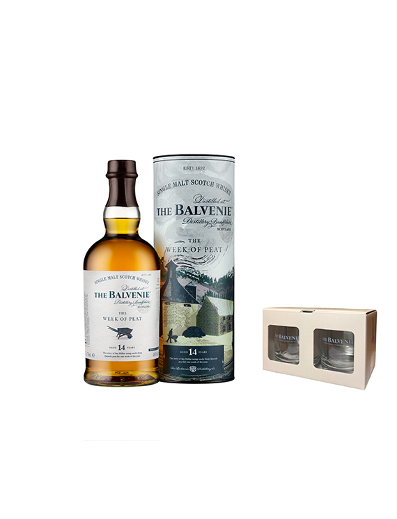 Butelka i tuba 14-letniej szkockiej whisky The Balvenie The Week of Peat w zestawie z dwoma szklankami.
