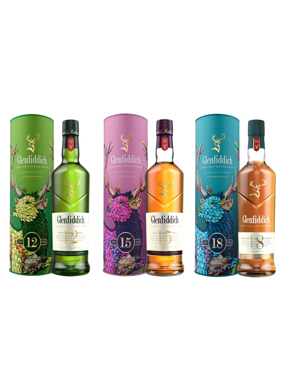 Trzy butelki i tuby szkockiej single malt whisky Glenfiddich w limitowanych opakowaniach: 12, 15 i 18 lat, z kolorowymi, artystycznymi wzorami.