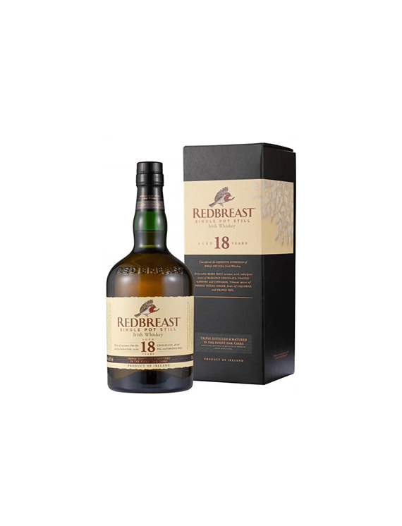 Butelka i pudełko 18-letniej irlandzkiej whiskey Redbreast Single Pot Still w czarnym opakowaniu